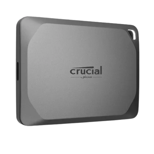 Crucial X9 Pro SSD di động màu đen đặt cạnh laptop Acer Swift Go trên bàn làm việc, thể hiện tính năng di động và hiệu suất