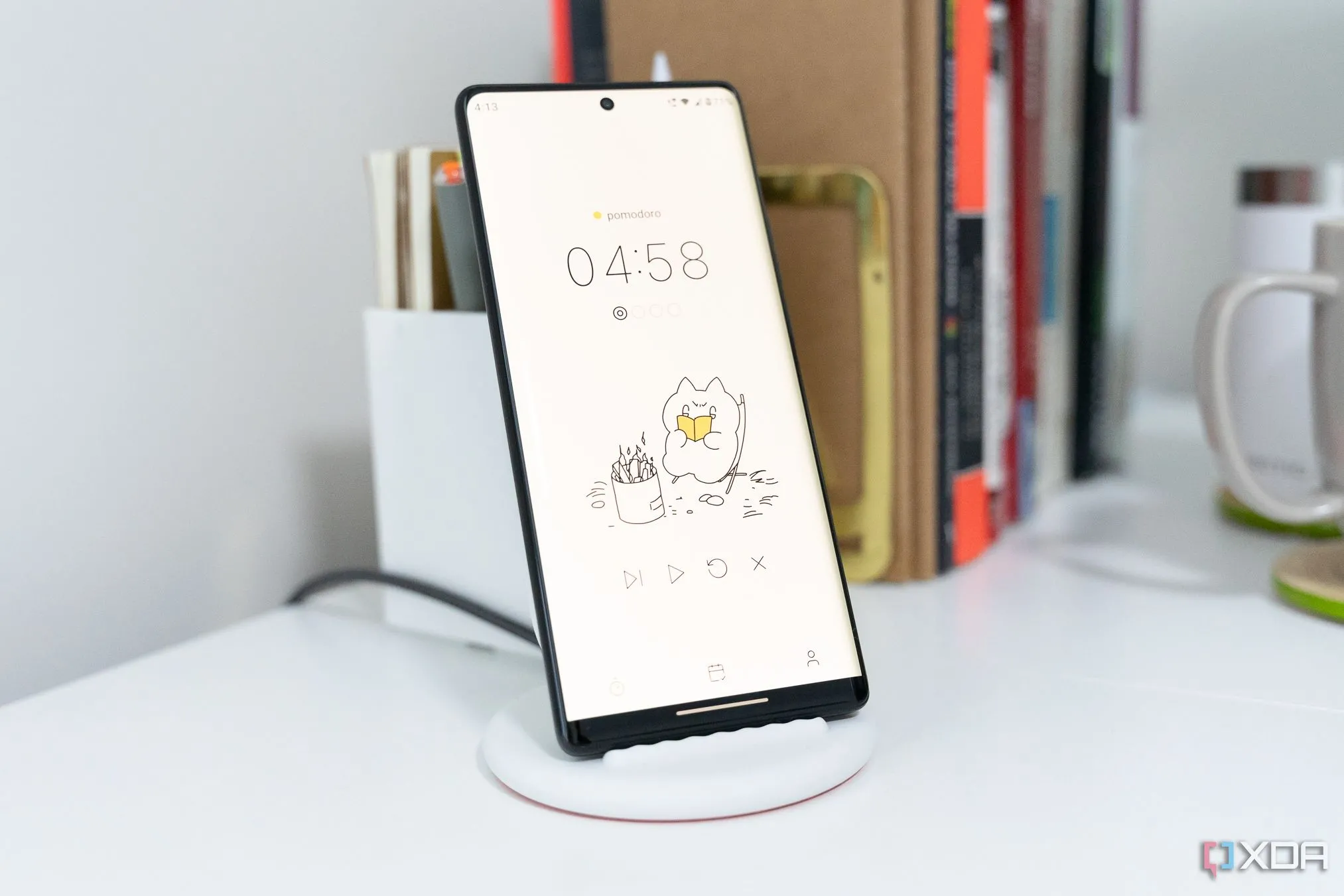 Giao diện ứng dụng Pomocat với hình ảnh chú mèo hoạt hình đang tập trung làm việc.