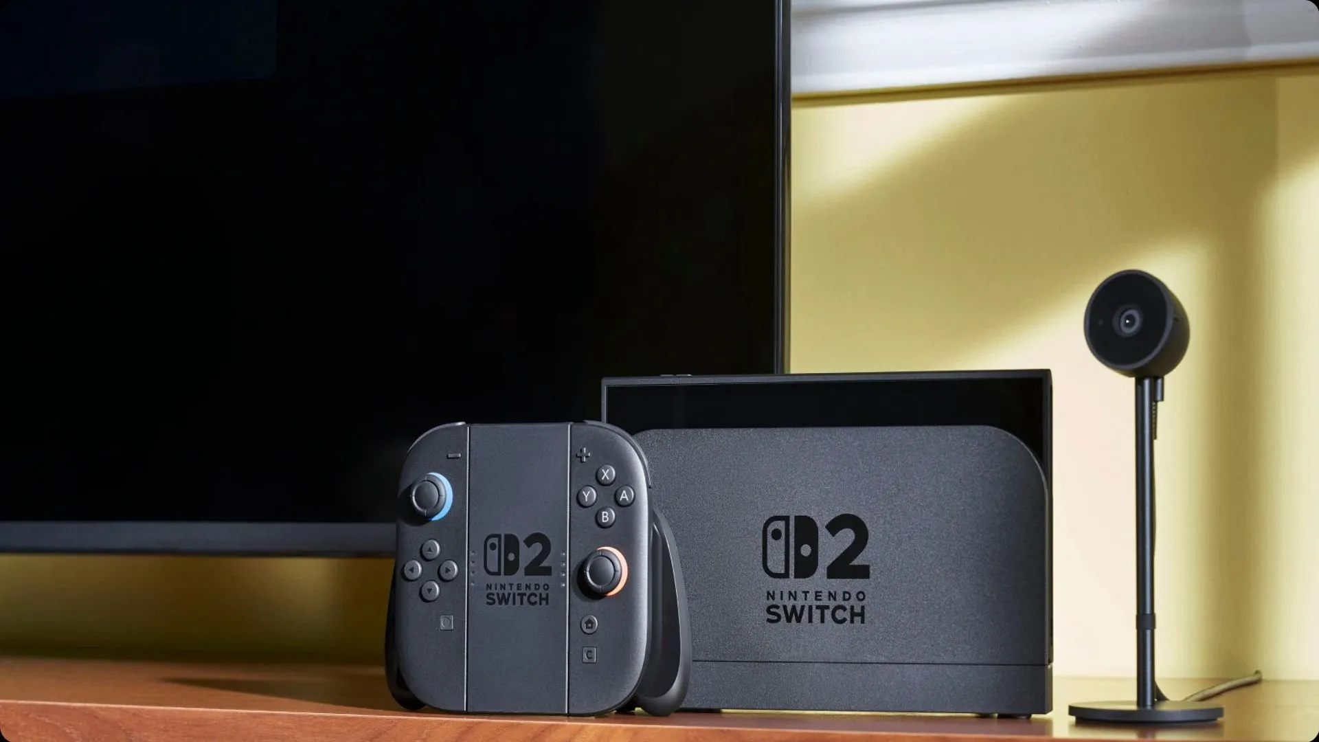 Hình ảnh concept máy chơi game Nintendo Switch 2 cùng bộ điều khiển Joy-Con và mic, minh họa thiết kế và phụ kiện kèm theo