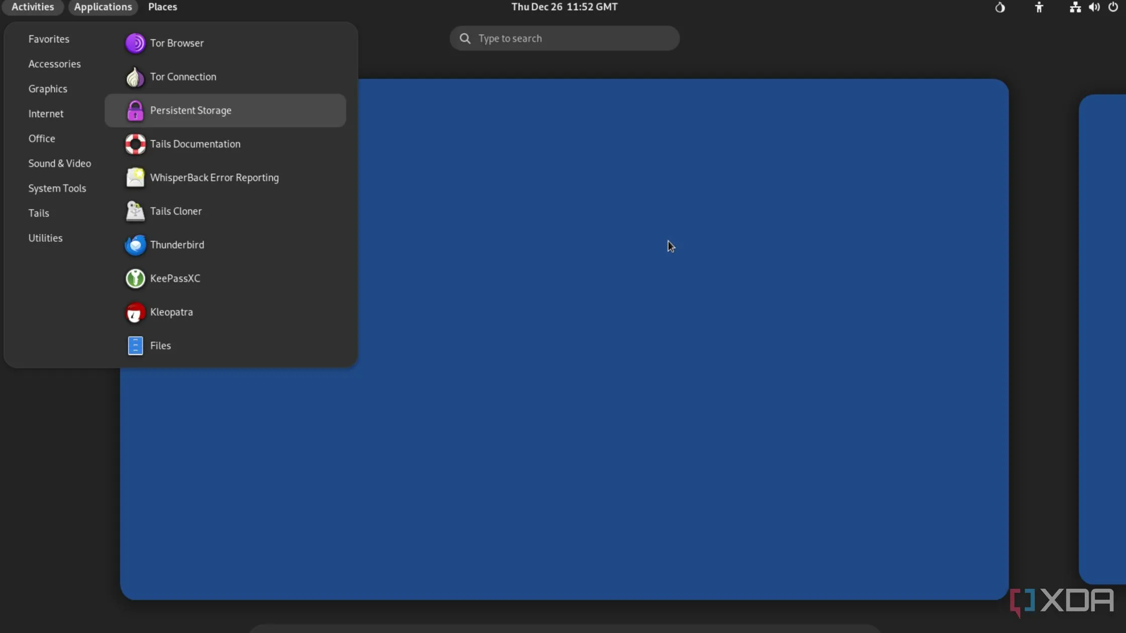 Màn hình nền của hệ điều hành Tails OS với biểu tượng Tor Browser và các công cụ bảo mật, thể hiện sự tập trung vào quyền riêng tư và ẩn danh.